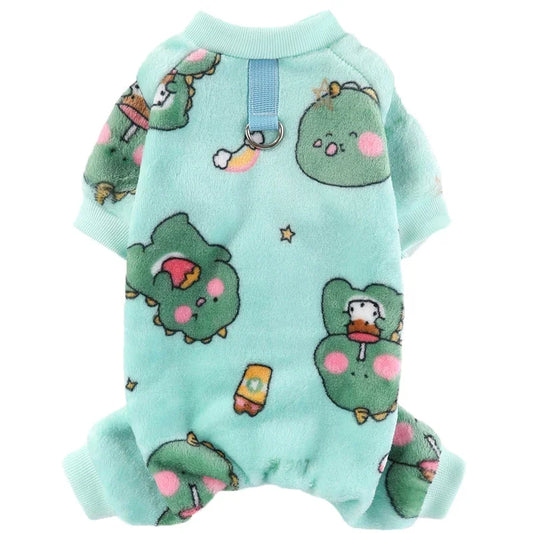 Large dog wearing soft cartoon flannel pajamas with bear and dinosaur print.

