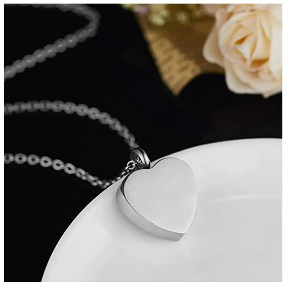 silver dog ashes pendent, buy dog supplies and memorials accessories only at say svaha in London and new York